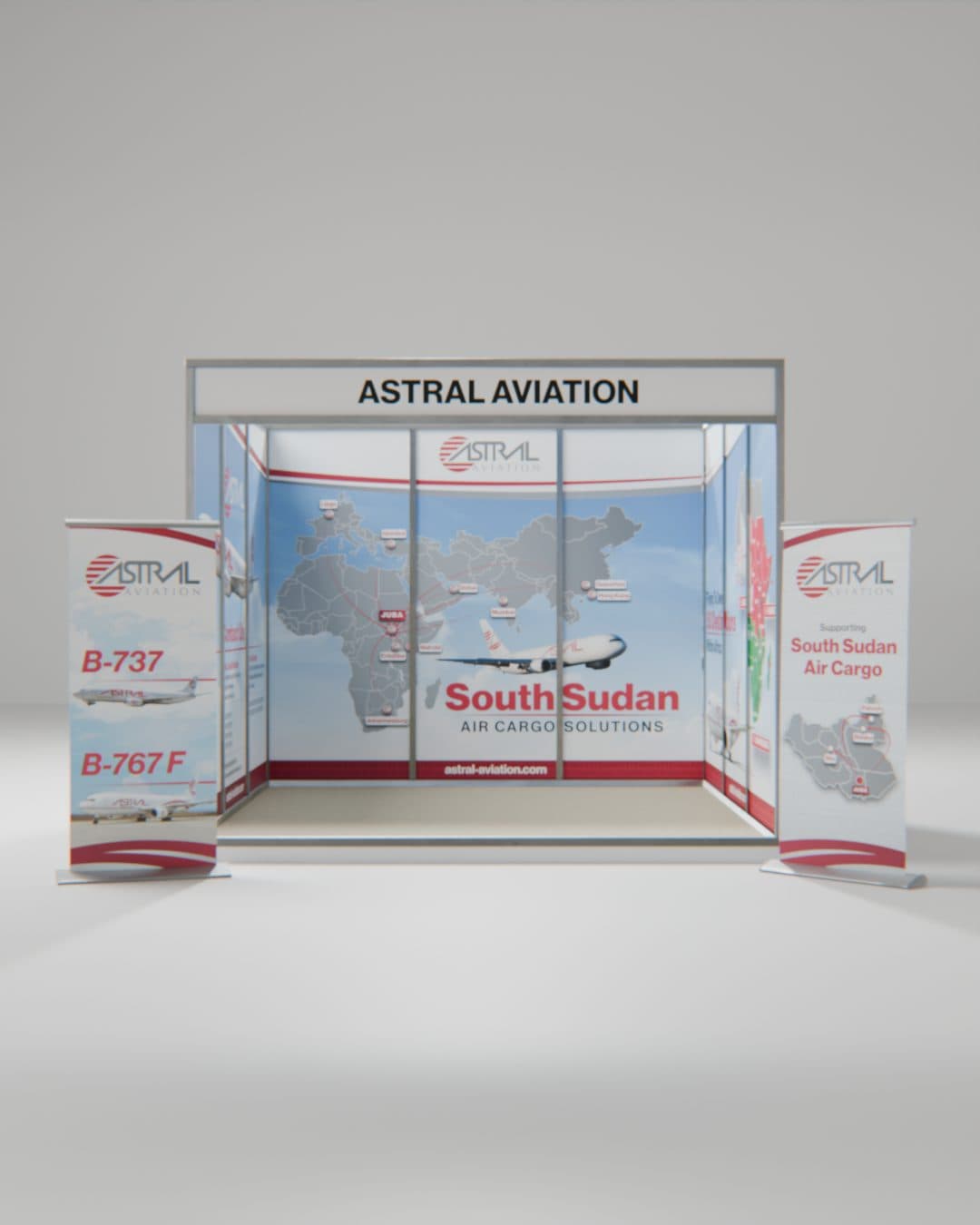 Astral Aviation shell-scheme stand with a South Sudan air cargo map wall, flanked by two fleet pull-up banners